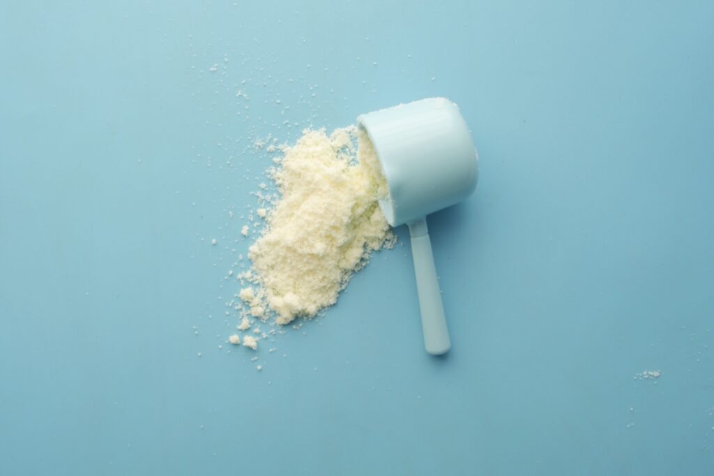 A scoop of collagen peptide powder supplement