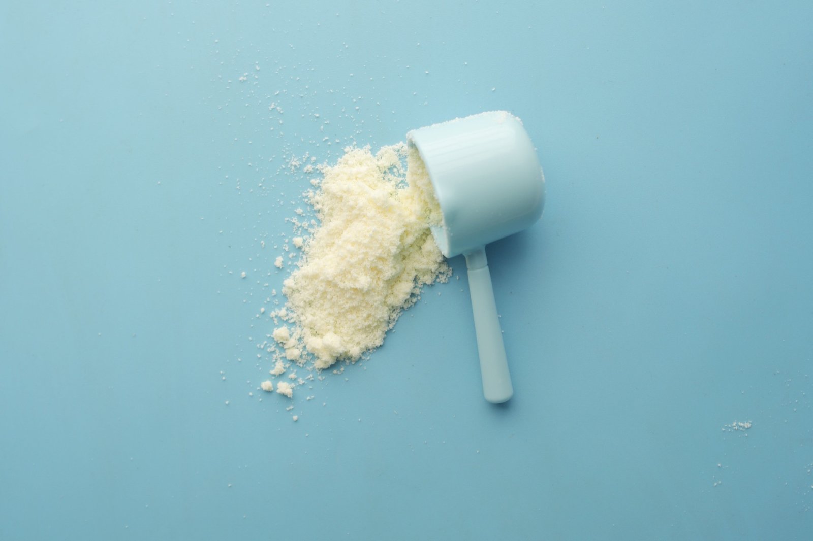 A scoop of collagen peptide powder supplement