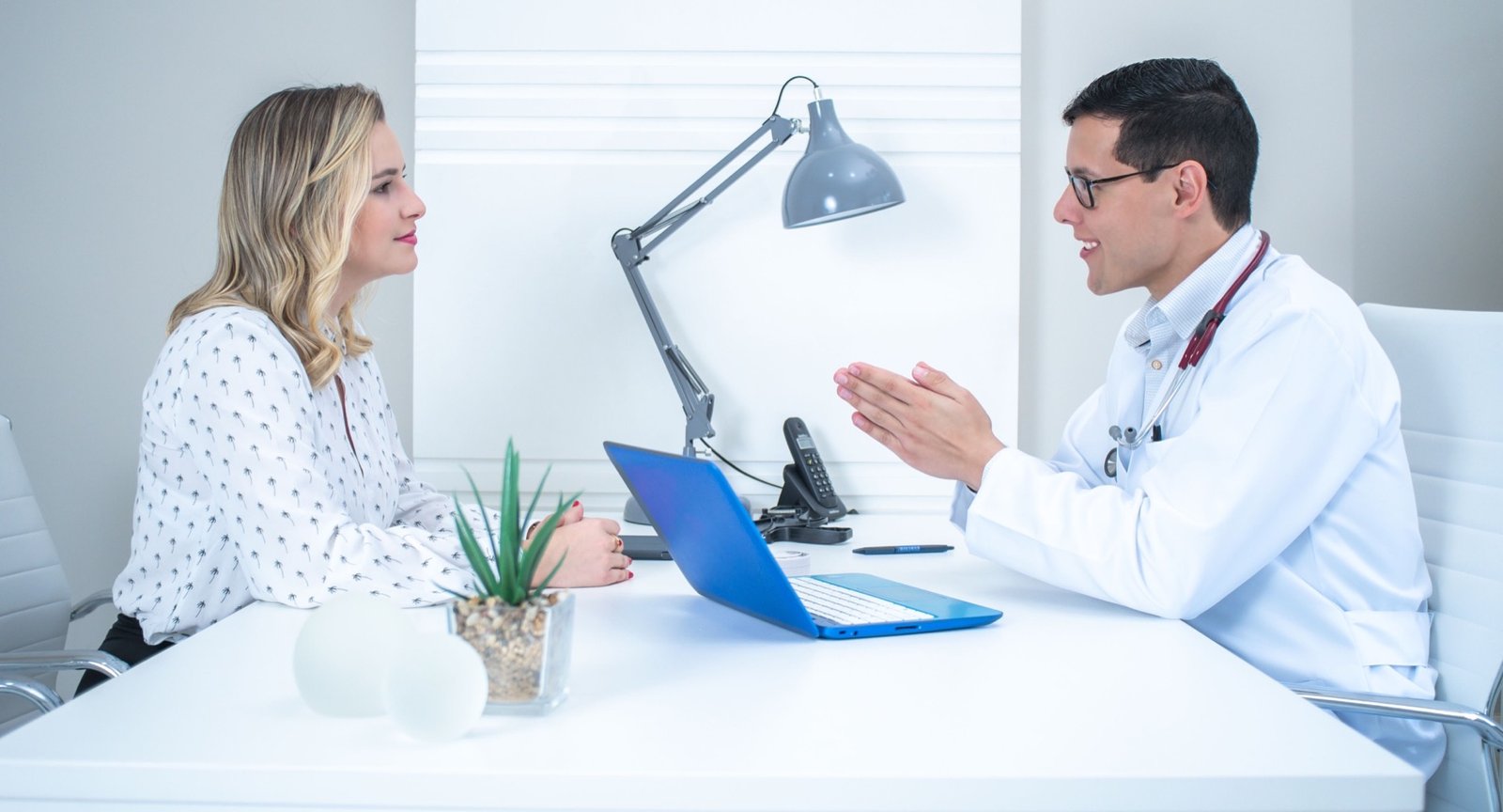 Doctor consulting with a patient in a modern medical office