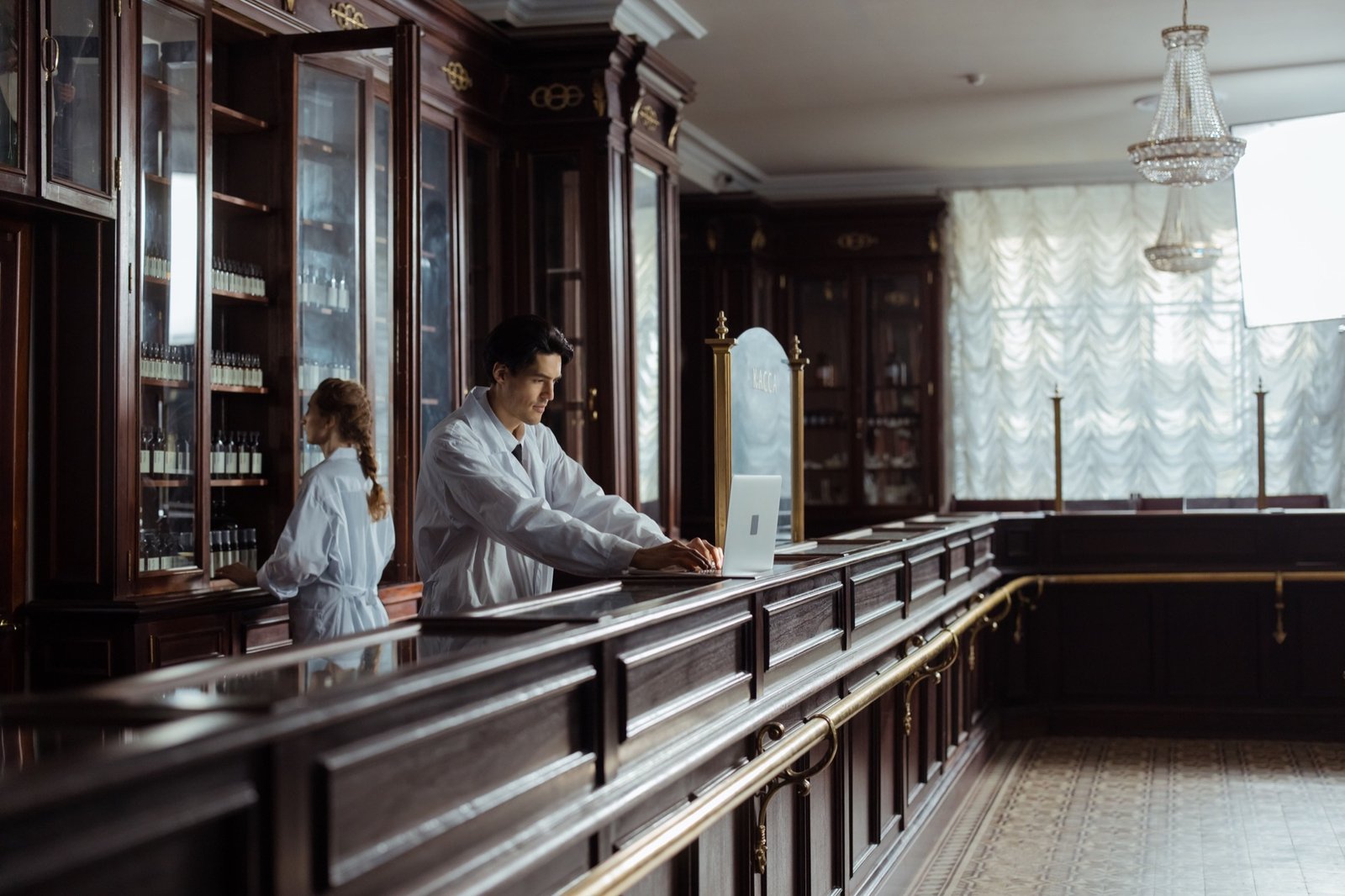 Pharmacists working together at the pharmacy counter