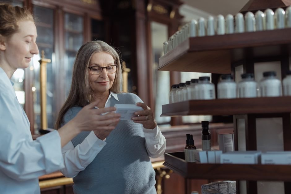 Pharmacist comparing two medicine products