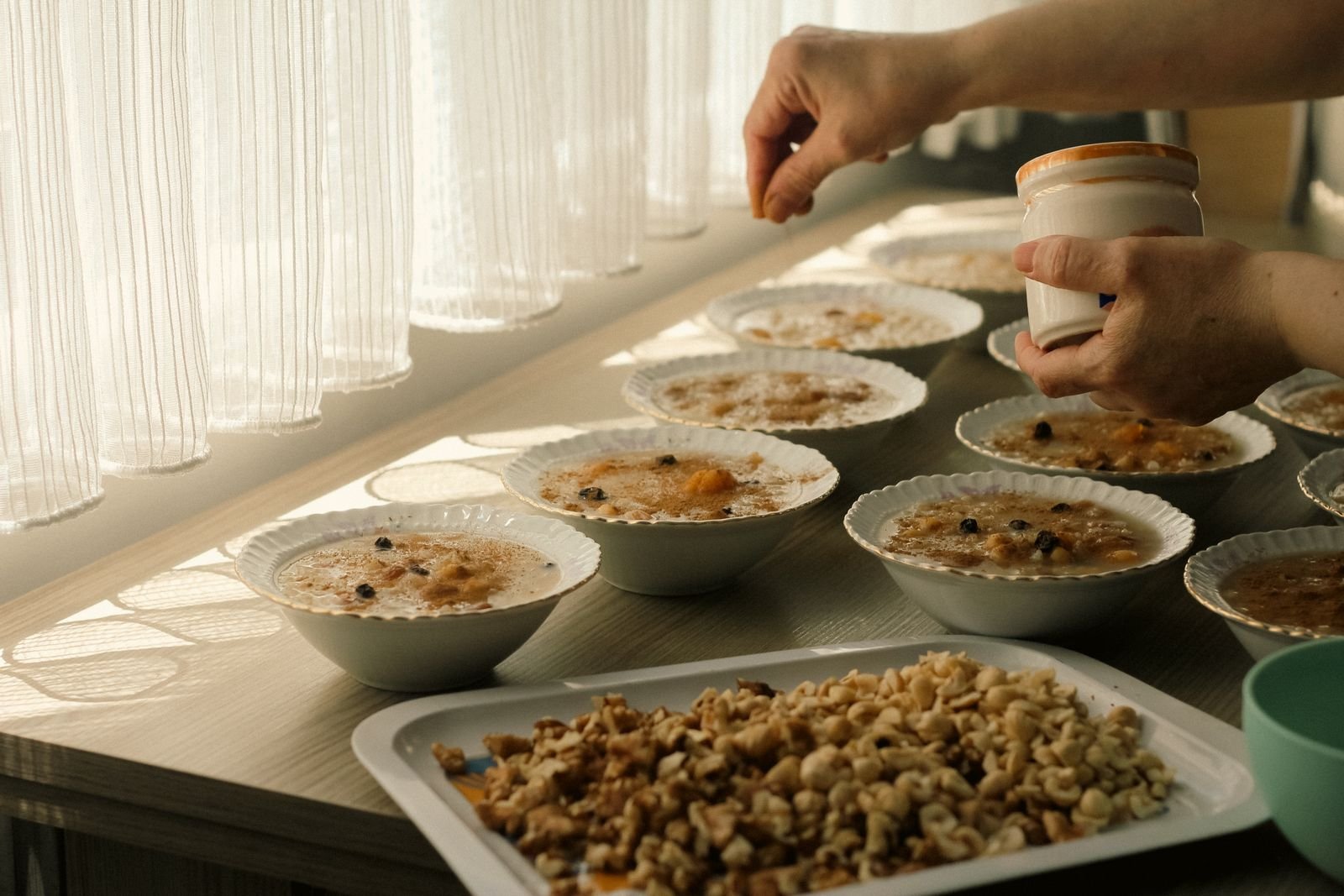 Bowls of oatmeal on a table, a fiber-rich food that helps with bowel movements unlike hemorrhoid suppositories
