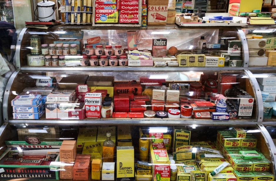 Hemorrhoid and fissure cream products displayed on a pharmacy shelf