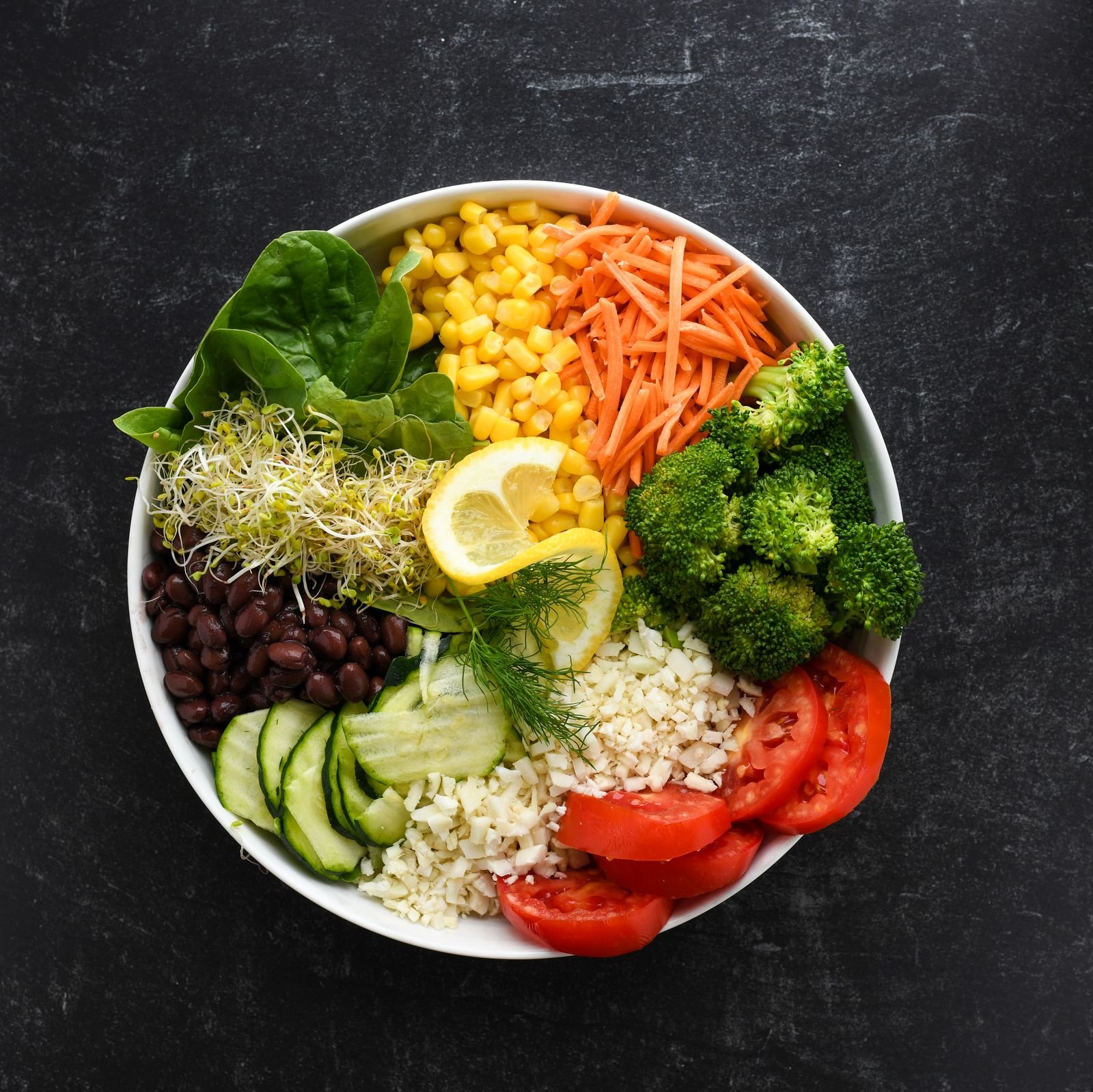 Salad bowl with beans and fresh vegetables, fiber that helps stop alcohol from making hemorrhoids worse